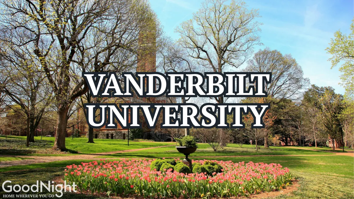 A vibrant exterior scene with a grand fountain, colorful flower beds, mature trees, and a stately building in the distance. The park-like setting is lively and ideal for walking, studying, relaxing, and socializing, with ample green space and inviting landscape features.